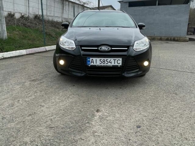 Черный Форд Фокус, объемом двигателя 1.56 л и пробегом 180 тыс. км за 7800 $, фото 1 на Automoto.ua
