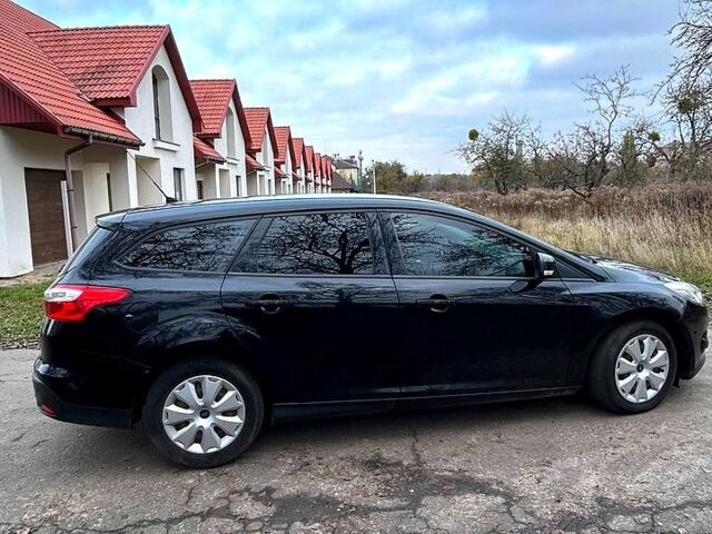 Черный Форд Фокус, объемом двигателя 1.6 л и пробегом 205 тыс. км за 8200 $, фото 1 на Automoto.ua