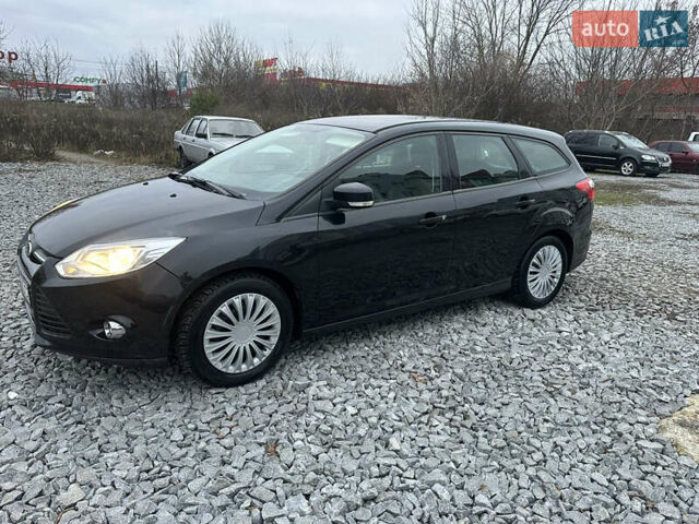 Черный Форд Фокус, объемом двигателя 1.6 л и пробегом 233 тыс. км за 6400 $, фото 1 на Automoto.ua