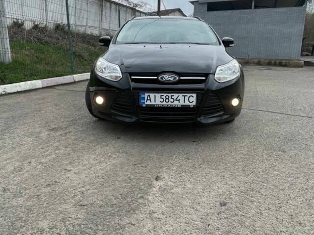 Черный Форд Фокус, объемом двигателя 1.56 л и пробегом 170 тыс. км за 8500 $, фото 1 на Automoto.ua