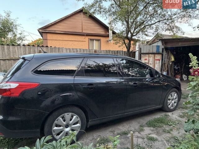 Черный Форд Фокус, объемом двигателя 1.6 л и пробегом 209 тыс. км за 7500 $, фото 1 на Automoto.ua