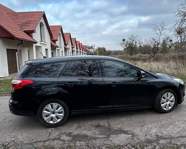 Черный Форд Фокус, объемом двигателя 1.6 л и пробегом 205 тыс. км за 8200 $, фото 1 на Automoto.ua