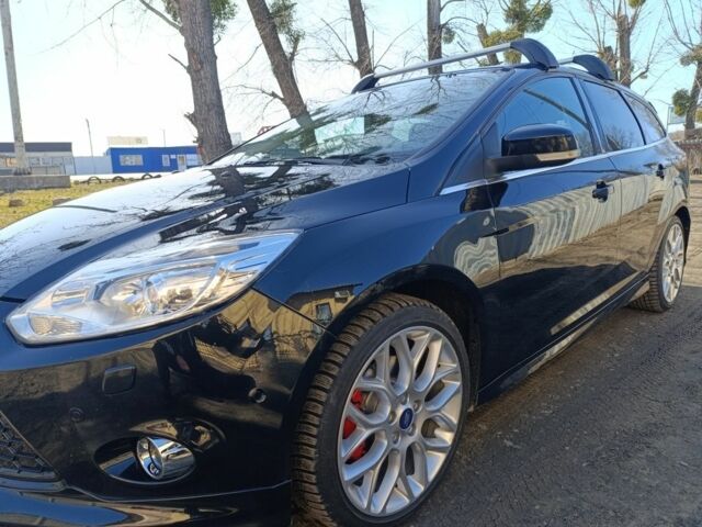 Черный Форд Фокус, объемом двигателя 1.6 л и пробегом 175 тыс. км за 8500 $, фото 1 на Automoto.ua