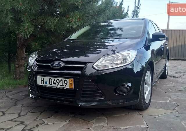 Черный Форд Фокус, объемом двигателя 1.6 л и пробегом 177 тыс. км за 7600 $, фото 1 на Automoto.ua