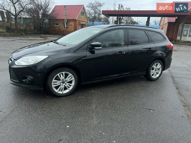 Черный Форд Фокус, объемом двигателя 1.6 л и пробегом 180 тыс. км за 7400 $, фото 1 на Automoto.ua
