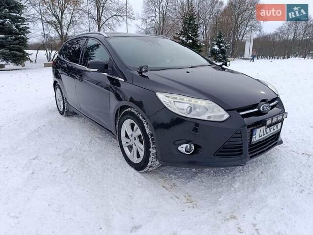 Черный Форд Фокус, объемом двигателя 1.56 л и пробегом 335 тыс. км за 7700 $, фото 1 на Automoto.ua