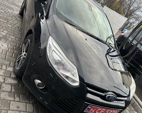 Чорний Форд Фокус, об'ємом двигуна 1.59 л та пробігом 229 тис. км за 8750 $, фото 1 на Automoto.ua