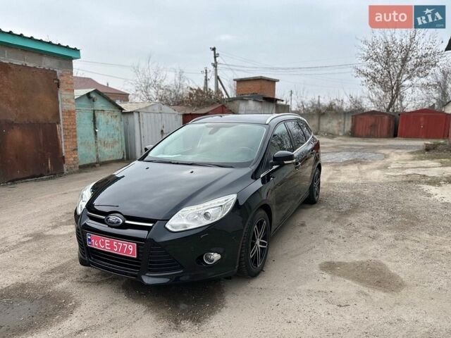 Черный Форд Фокус, объемом двигателя 1.59 л и пробегом 229 тыс. км за 8750 $, фото 1 на Automoto.ua