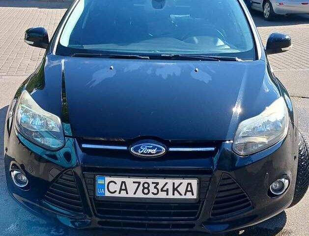 Чорний Форд Фокус, об'ємом двигуна 1.56 л та пробігом 287 тис. км за 7500 $, фото 1 на Automoto.ua