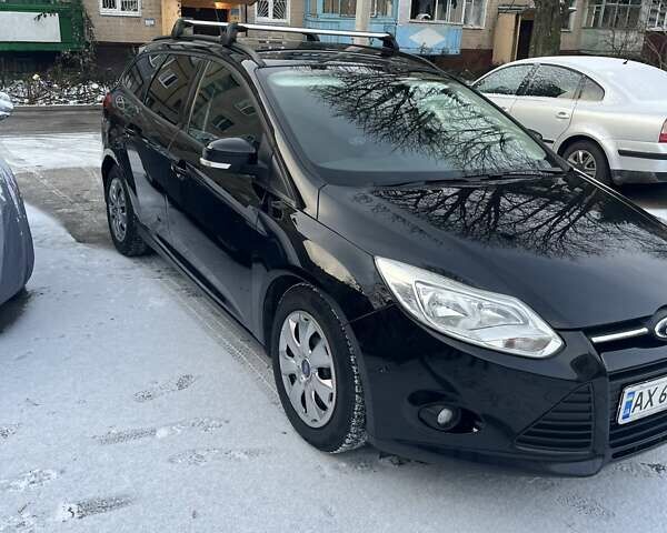 Чорний Форд Фокус, об'ємом двигуна 1 л та пробігом 130 тис. км за 8150 $, фото 1 на Automoto.ua