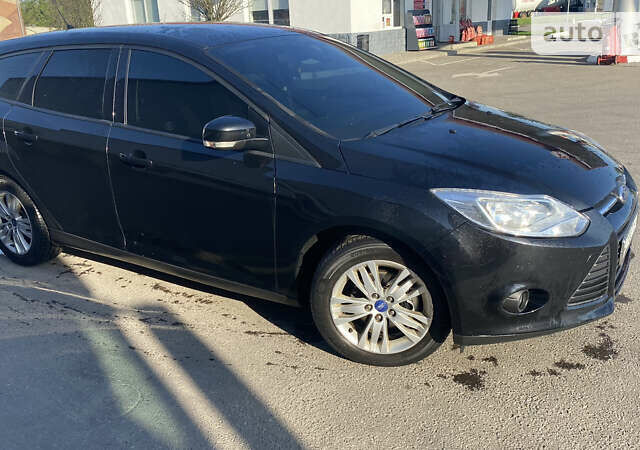 Черный Форд Фокус, объемом двигателя 1.6 л и пробегом 295 тыс. км за 6800 $, фото 1 на Automoto.ua