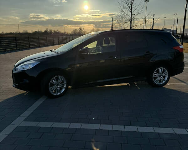 Черный Форд Фокус, объемом двигателя 1 л и пробегом 160 тыс. км за 7200 $, фото 1 на Automoto.ua