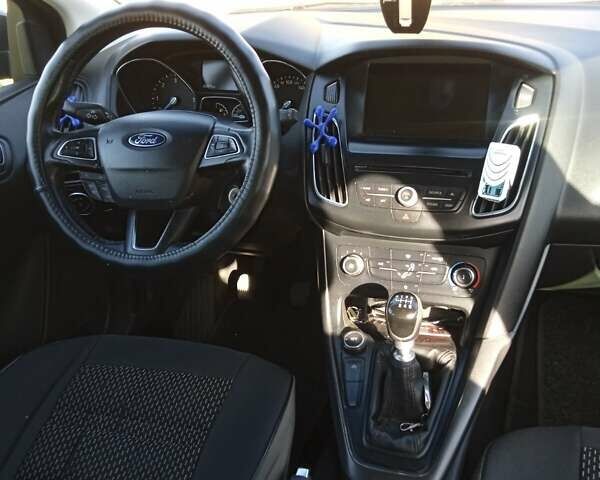 Черный Форд Фокус, объемом двигателя 1.5 л и пробегом 260 тыс. км за 7800 $, фото 1 на Automoto.ua