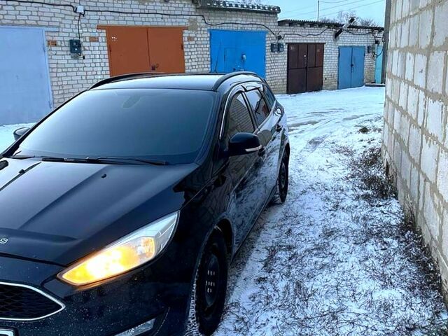 Черный Форд Фокус, объемом двигателя 1.5 л и пробегом 349 тыс. км за 9499 $, фото 1 на Automoto.ua