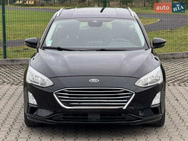 Черный Форд Фокус, объемом двигателя 1 л и пробегом 105 тыс. км за 13950 $, фото 1 на Automoto.ua
