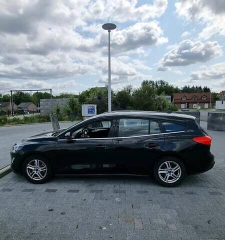 Черный Форд Фокус, объемом двигателя 1.5 л и пробегом 202 тыс. км за 11000 $, фото 1 на Automoto.ua