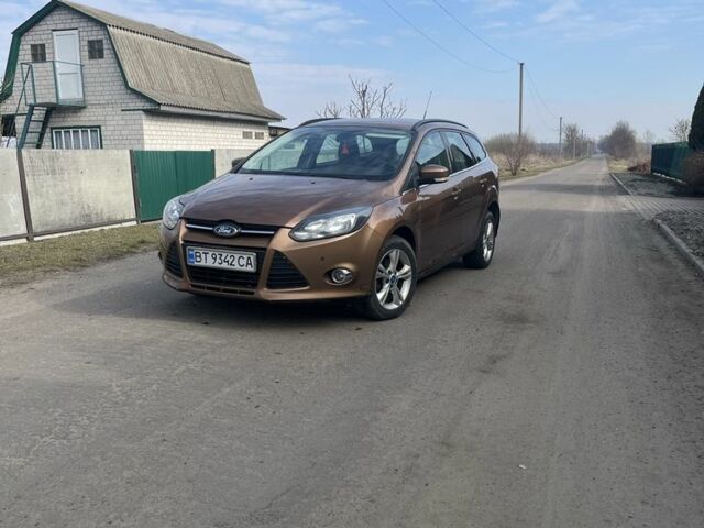 Коричневий Форд Фокус, об'ємом двигуна 1 л та пробігом 200 тис. км за 5100 $, фото 1 на Automoto.ua