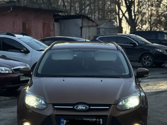 Коричневий Форд Фокус, об'ємом двигуна 1 л та пробігом 203 тис. км за 6499 $, фото 1 на Automoto.ua