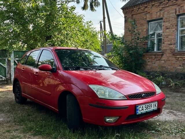 Красный Форд Фокус, объемом двигателя 1.8 л и пробегом 333 тыс. км за 2650 $, фото 1 на Automoto.ua