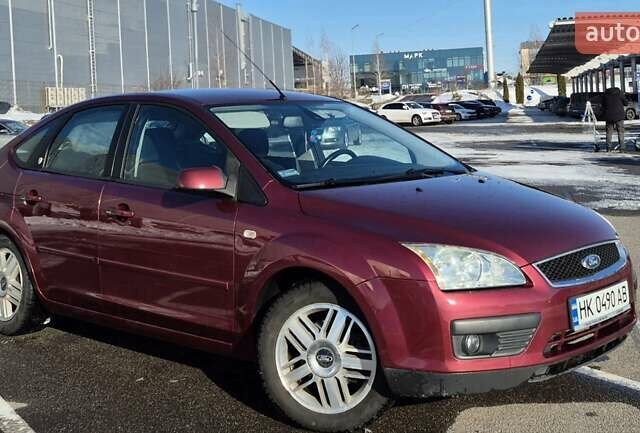 Красный Форд Фокус, объемом двигателя 1.6 л и пробегом 276 тыс. км за 4900 $, фото 1 на Automoto.ua