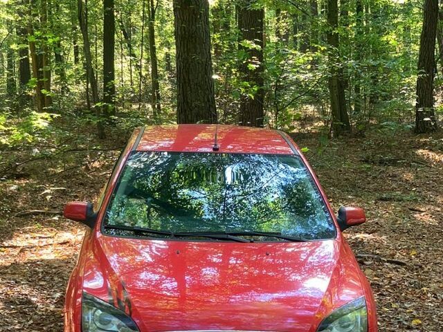 Красный Форд Фокус, объемом двигателя 2 л и пробегом 335 тыс. км за 4700 $, фото 1 на Automoto.ua