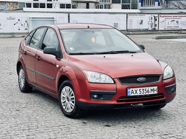 Красный Форд Фокус, объемом двигателя 1.6 л и пробегом 222 тыс. км за 3999 $, фото 1 на Automoto.ua