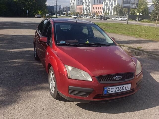 Красный Форд Фокус, объемом двигателя 1.39 л и пробегом 323 тыс. км за 3100 $, фото 1 на Automoto.ua