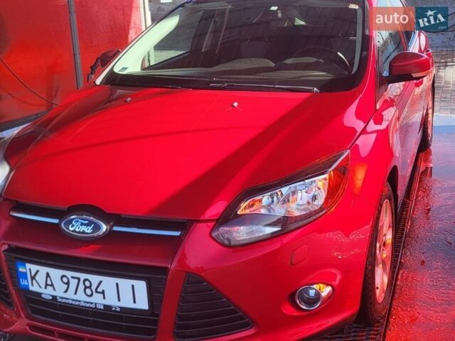Красный Форд Фокус, объемом двигателя 1.56 л и пробегом 95 тыс. км за 7500 $, фото 1 на Automoto.ua