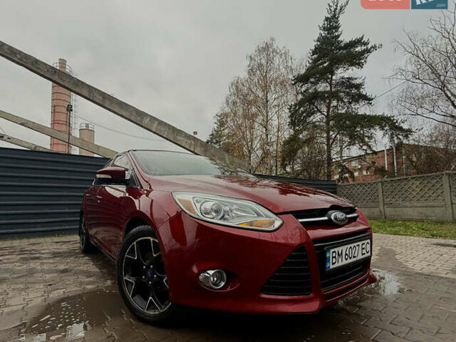 Красный Форд Фокус, объемом двигателя 2 л и пробегом 115 тыс. км за 8600 $, фото 1 на Automoto.ua