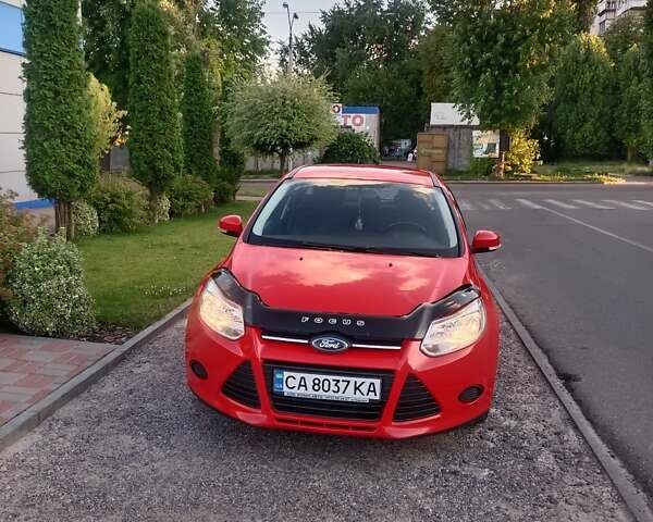 Червоний Форд Фокус, об'ємом двигуна 1 л та пробігом 189 тис. км за 7350 $, фото 1 на Automoto.ua