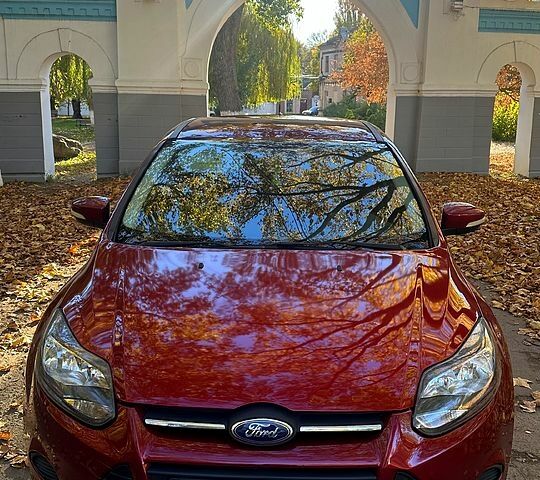 Червоний Форд Фокус, об'ємом двигуна 2 л та пробігом 138 тис. км за 6700 $, фото 1 на Automoto.ua