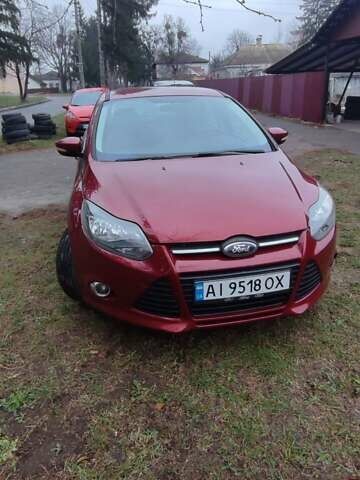 Червоний Форд Фокус, об'ємом двигуна 2 л та пробігом 215 тис. км за 7000 $, фото 1 на Automoto.ua