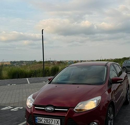 Красный Форд Фокус, объемом двигателя 2 л и пробегом 205 тыс. км за 7350 $, фото 1 на Automoto.ua