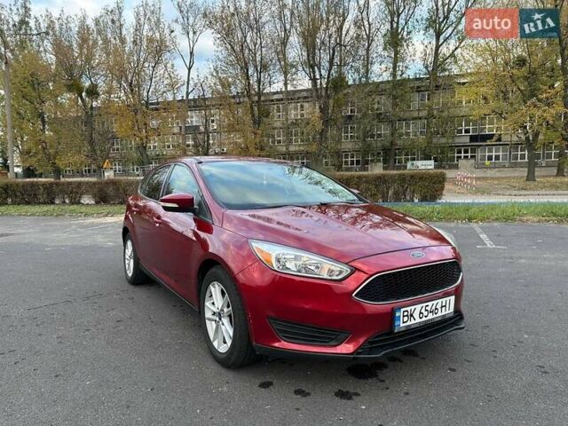 Красный Форд Фокус, объемом двигателя 2 л и пробегом 206 тыс. км за 8500 $, фото 1 на Automoto.ua