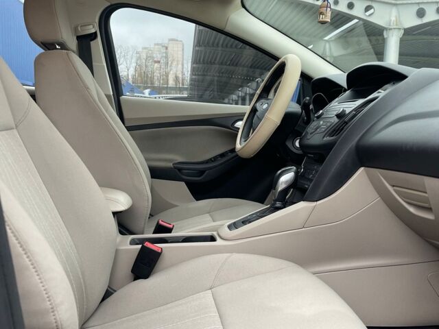 Красный Форд Фокус, объемом двигателя 2 л и пробегом 87 тыс. км за 9100 $, фото 1 на Automoto.ua