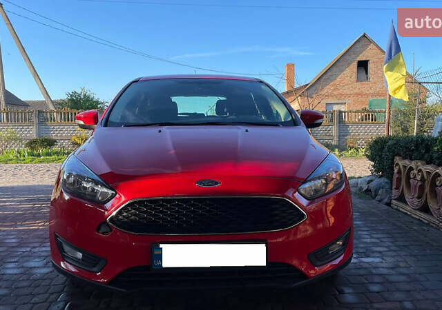 Червоний Форд Фокус, об'ємом двигуна 2 л та пробігом 125 тис. км за 9500 $, фото 1 на Automoto.ua