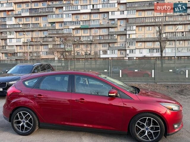 Красный Форд Фокус, объемом двигателя 2 л и пробегом 107 тыс. км за 9000 $, фото 1 на Automoto.ua