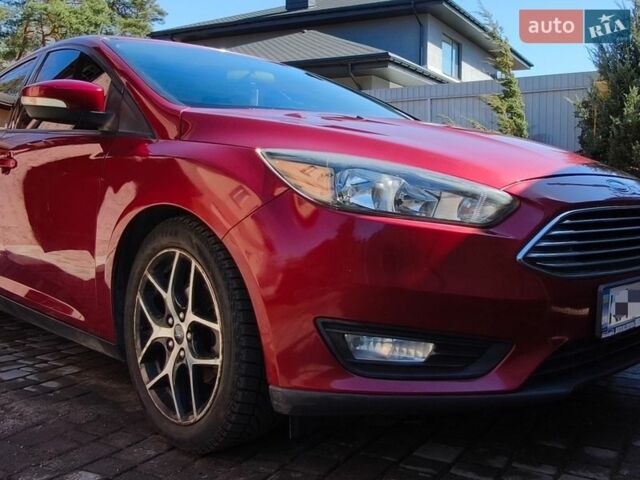 Красный Форд Фокус, объемом двигателя 2 л и пробегом 113 тыс. км за 10500 $, фото 1 на Automoto.ua