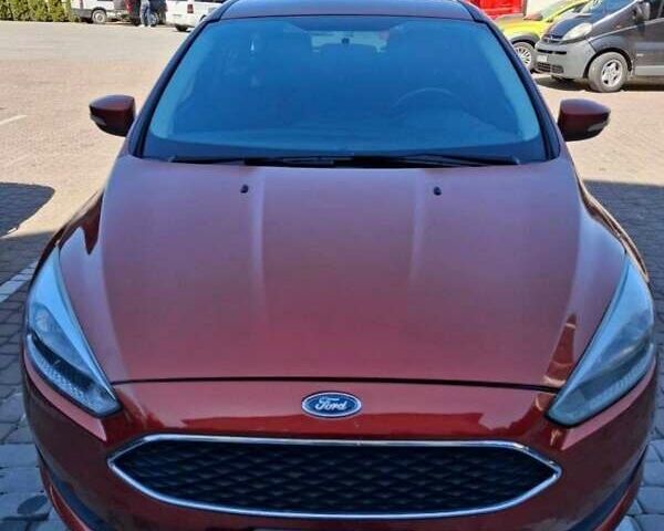 Красный Форд Фокус, объемом двигателя 2.02 л и пробегом 154 тыс. км за 9300 $, фото 1 на Automoto.ua