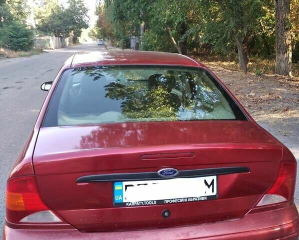 Красный Форд Фокус, объемом двигателя 2 л и пробегом 260 тыс. км за 3100 $, фото 1 на Automoto.ua