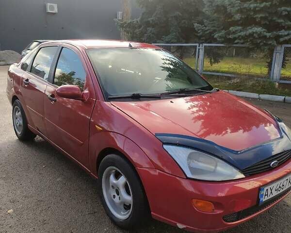 Красный Форд Фокус, объемом двигателя 2 л и пробегом 200 тыс. км за 2700 $, фото 1 на Automoto.ua