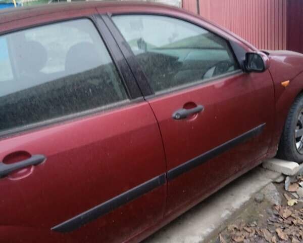 Червоний Форд Фокус, об'ємом двигуна 1.8 л та пробігом 246 тис. км за 2800 $, фото 1 на Automoto.ua