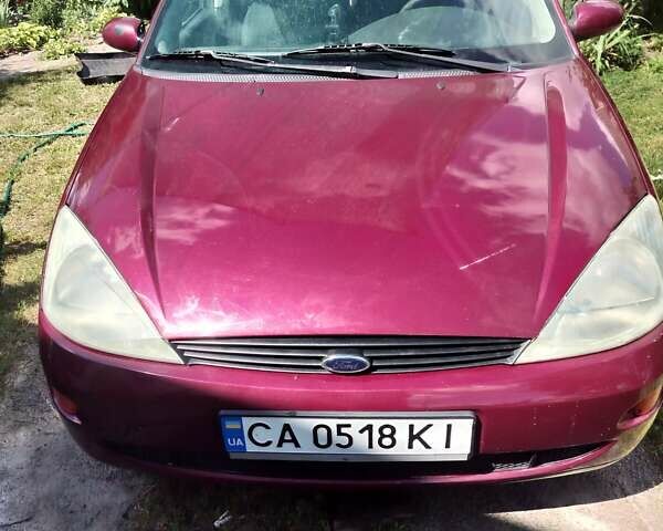 Красный Форд Фокус, объемом двигателя 1.6 л и пробегом 539 тыс. км за 3000 $, фото 1 на Automoto.ua