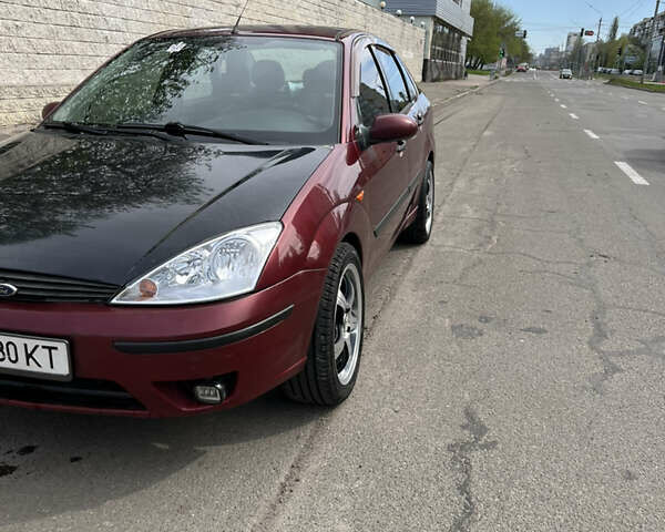 Красный Форд Фокус, объемом двигателя 1.8 л и пробегом 250 тыс. км за 2999 $, фото 1 на Automoto.ua