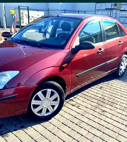 Красный Форд Фокус, объемом двигателя 1.6 л и пробегом 260 тыс. км за 2700 $, фото 1 на Automoto.ua