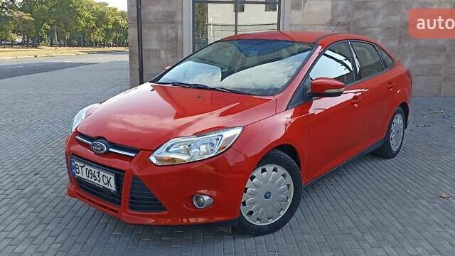 Червоний Форд Фокус, об'ємом двигуна 2 л та пробігом 169 тис. км за 7499 $, фото 1 на Automoto.ua