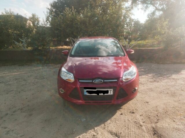Красный Форд Фокус, объемом двигателя 2 л и пробегом 124 тыс. км за 7200 $, фото 1 на Automoto.ua