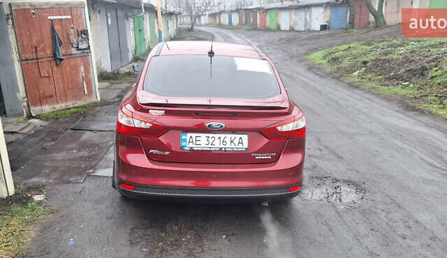 Красный Форд Фокус, объемом двигателя 2 л и пробегом 130 тыс. км за 9300 $, фото 1 на Automoto.ua