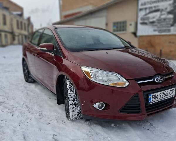 Красный Форд Фокус, объемом двигателя 2 л и пробегом 220 тыс. км за 6300 $, фото 1 на Automoto.ua