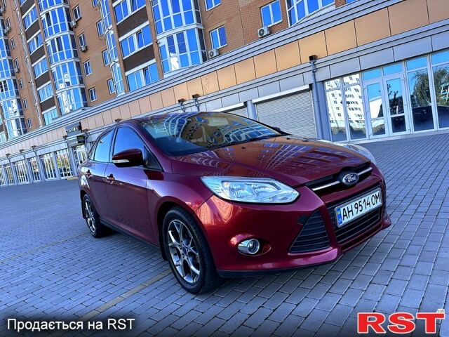 Червоний Форд Фокус, об'ємом двигуна 2 л та пробігом 204 тис. км за 7049 $, фото 1 на Automoto.ua